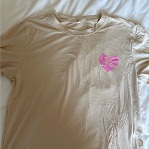 Christian Beige T-Shirt with Pink Heart Detail